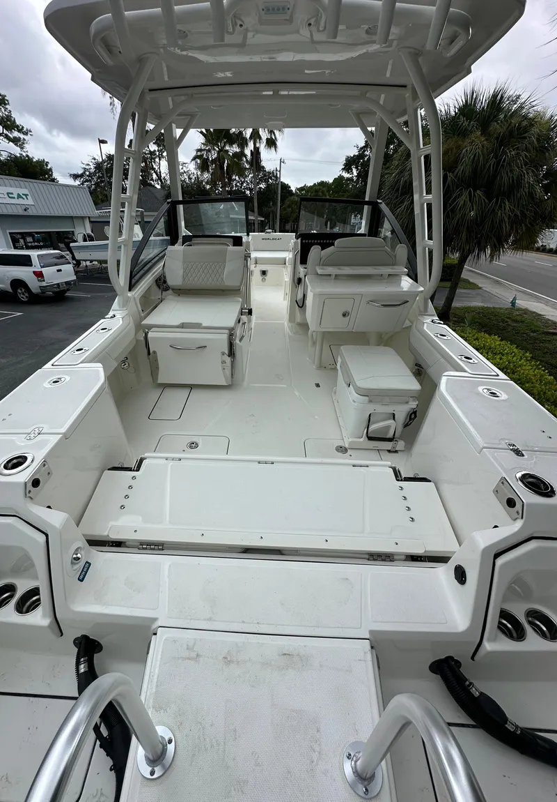 Slide: The Image of 2025 World Cat 260 DC-X boat interior, featuring spacious seating and modern design. - 3