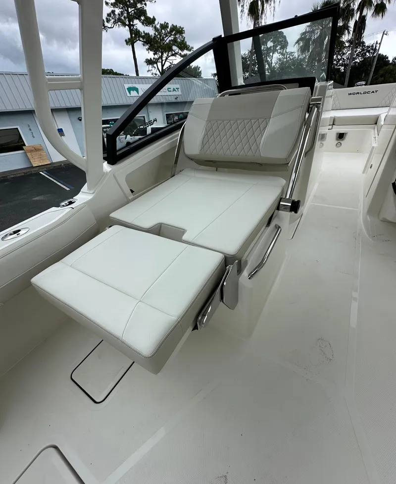 Slide: The Image of 2025 World Cat 260 DC-X boat interior with adjustable seating and modern design. - 6