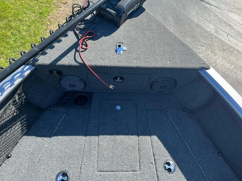 Slide: The Image of 2025 Lund 1775 Impact XS SS boat interior with speakers and wiring. - 13