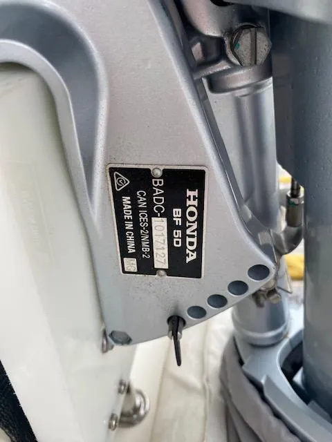 Slide: The Image of Honda BF50 engine label on a 2022 Beneteau Swift Trawler 41 Fly. - 21