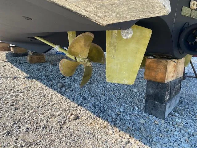 Slide: The Image of Propeller and rudder of 2022 Beneteau Swift Trawler 41 Fly on dry dock. - 25
