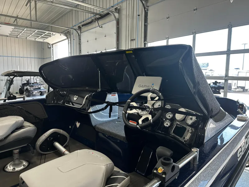 Slide: The Image of 2024 Nitro ZV19 Sport boat interior with Garmin navigation system. - 14