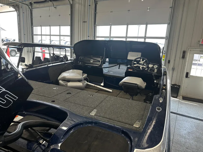 Slide: The Image of 2024 Nitro ZV19 Sport boat interior in a garage. - 5