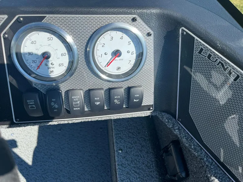 Slide: The Image of Dashboard of 2025 Lund 1650 Angler SS boat with speedometer and tachometer. - 15