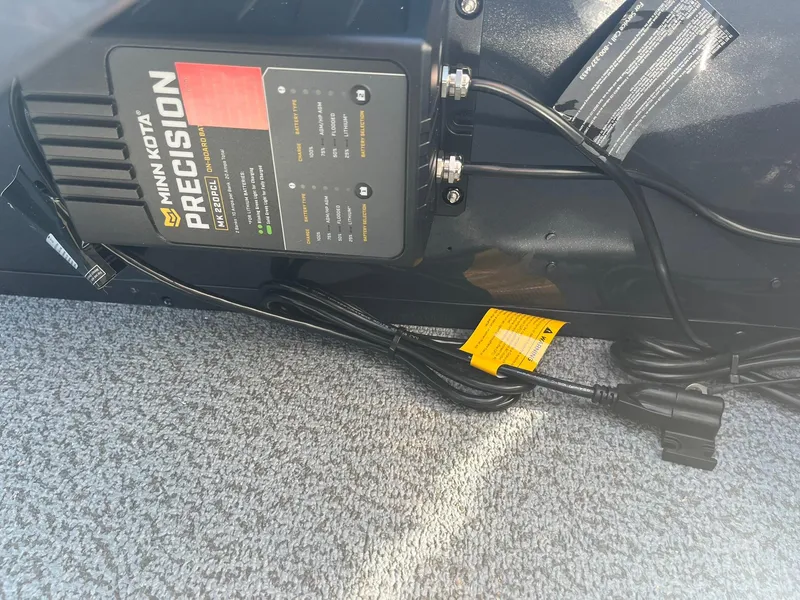 Slide: The Image of Minn Kota Precision charger in 2025 Lund 1650 Angler SS boat. - 21
