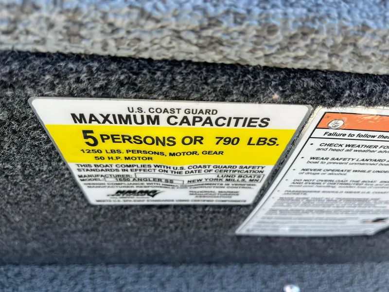 Slide: The Image of Lund 1650 Angler SS 2025 boat capacity label: 5 persons or 790 lbs. - 22