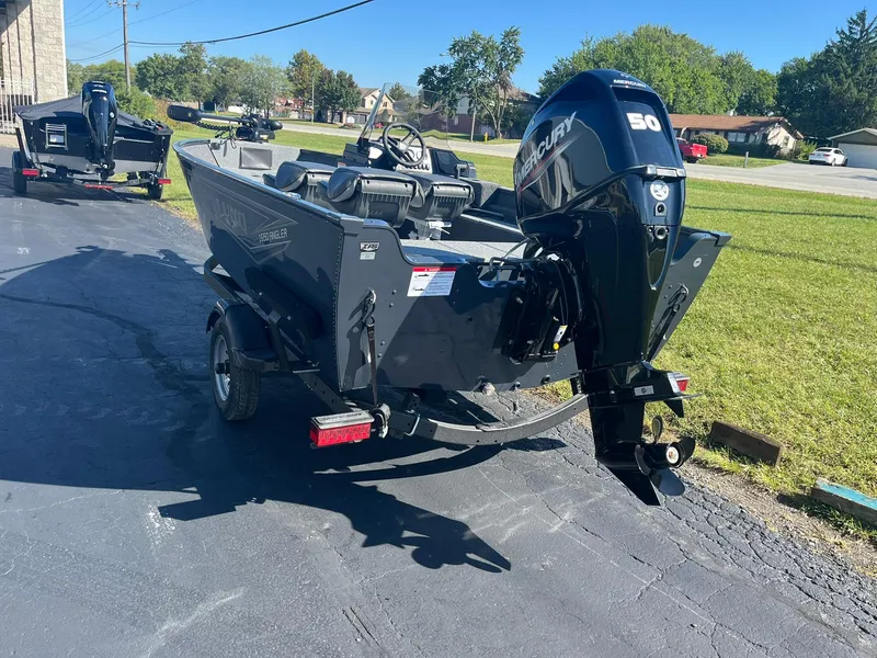 Slide: The Image of 2025 Lund 1650 Angler SS boat with Mercury 50 engine on a trailer. - 3