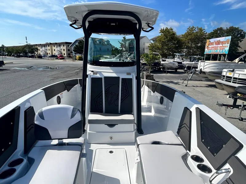 Slide: The Image of 2024 Scarab 255 Open ID boat interior with seating and console. - 15