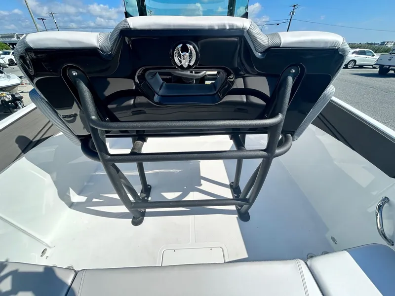 Slide: The Image of 2024 Scarab 255 Open ID boat interior with seating and railing. - 17