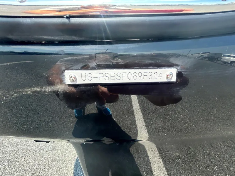 Slide: The Image of 2024 Scarab 255 Open ID boat hull identification number (HIN) plate. - 24