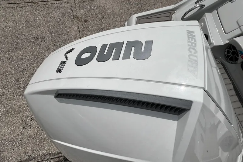 Slide: The Image of 2024 Crownline 250 XSS boat engine close-up. - 23