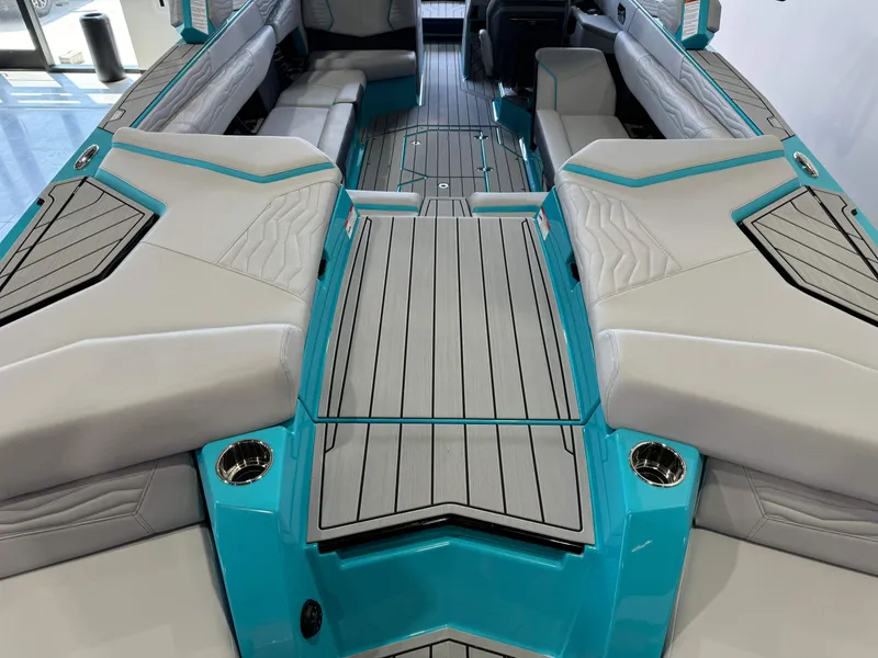 Slide: The Image of 2025 Nautique Super Air Nautique G25 interior, featuring luxurious seating and modern design. - 10