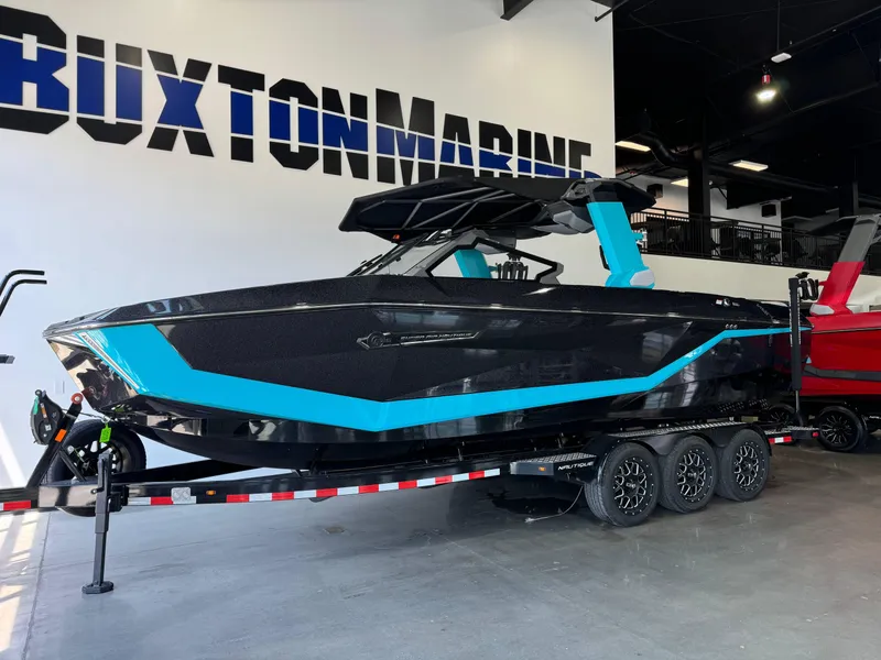 Slide: The Image of 2025 Nautique Super Air Nautique G25 boat on display at Ruxton Marine showroom. - 3