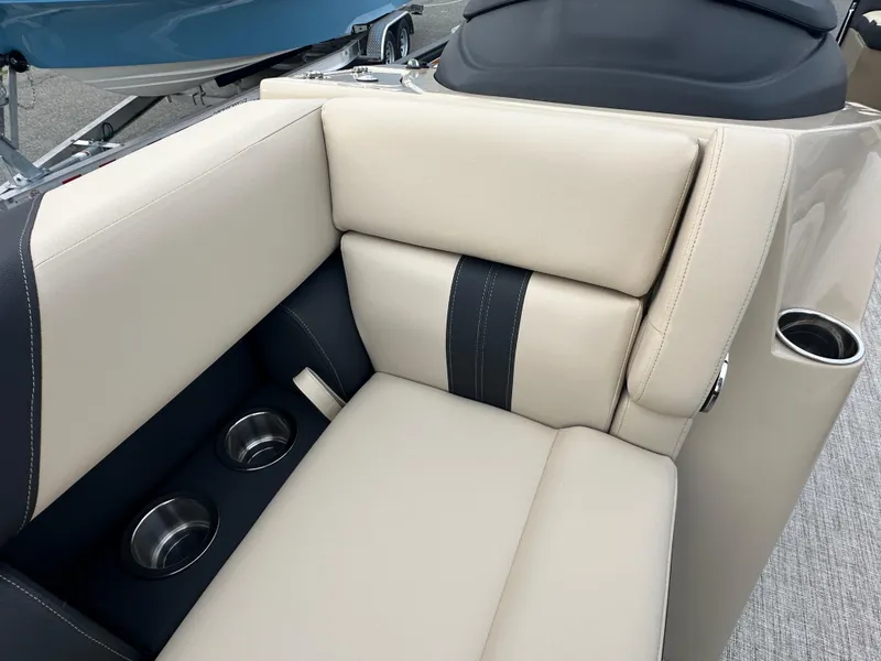 Slide: The Image of 2024 Berkshire 22RFX ARCH CTS 2.75 boat interior seating with cup holders. - 13
