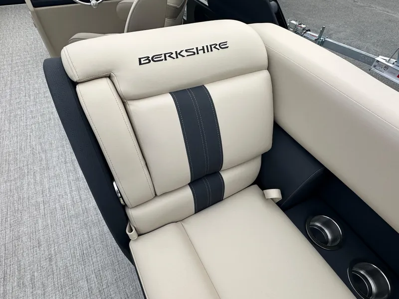 Slide: The Image of 2024 Berkshire 22RFX ARCH CTS 2.75 boat seat with logo and cup holders. - 23