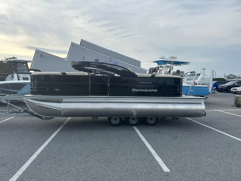 Slide: The Image of 2024 Berkshire 22RFX ARCH CTS 2.75 pontoon boat in a parking lot. - 27