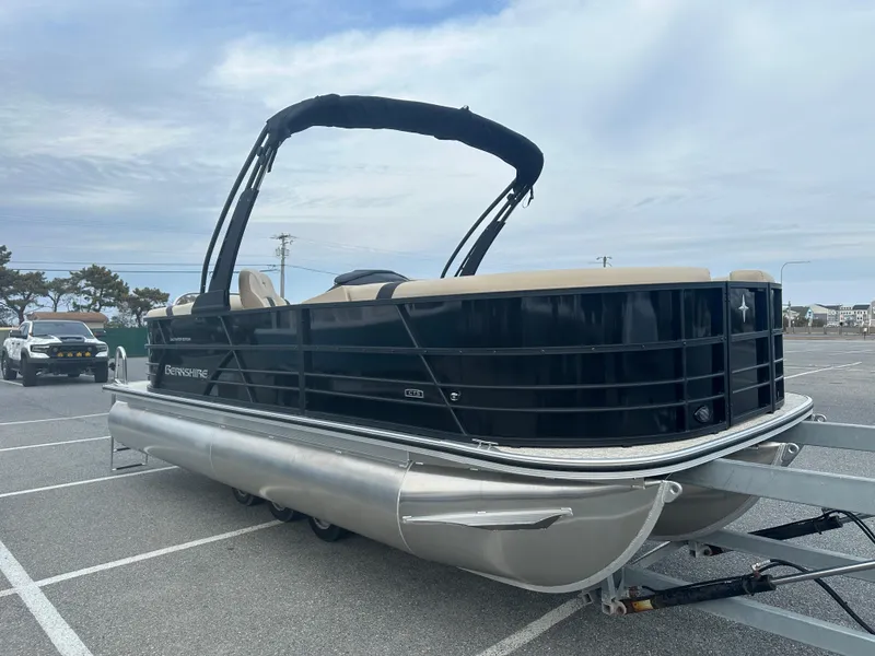 Slide: The Image of 2024 Berkshire 22RFX ARCH CTS 2.75 pontoon boat in a parking lot. - 3