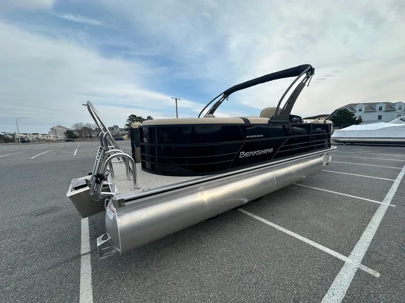 Slide: The Image of 2024 Berkshire 22RFX ARCH CTS 2.75 pontoon boat in a parking lot. - 4