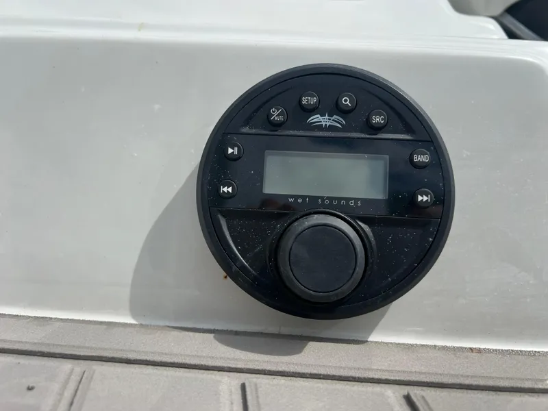 Slide: The Image of 2024 Crownline 270 XSS boat audio control panel. - 15