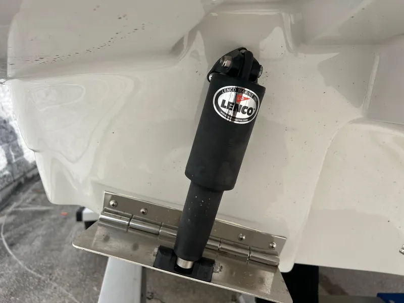 Slide: The Image of Lenco trim tab actuator on a 2024 Crownline 270 XSS boat. - 22