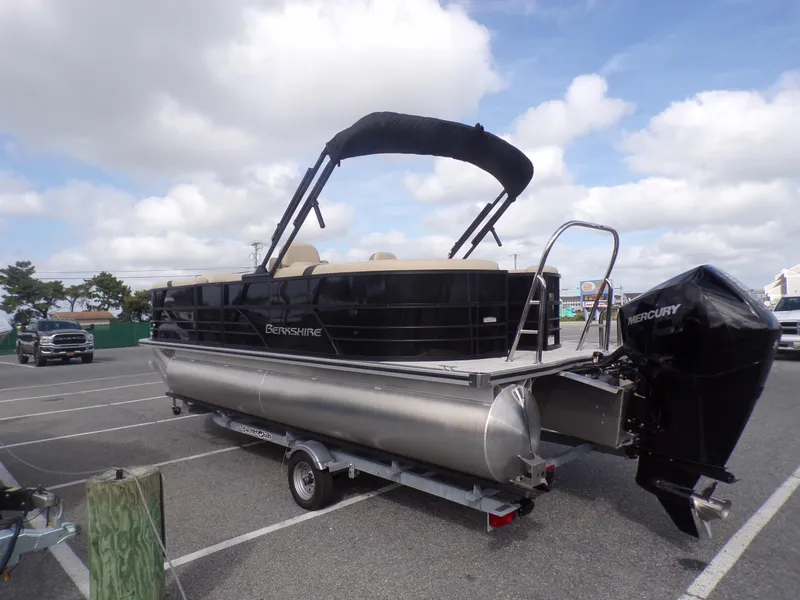 Slide: The Image of 2024 Berkshire 22RFX CTS pontoon boat for sale, black exterior, price reduced. - 2
