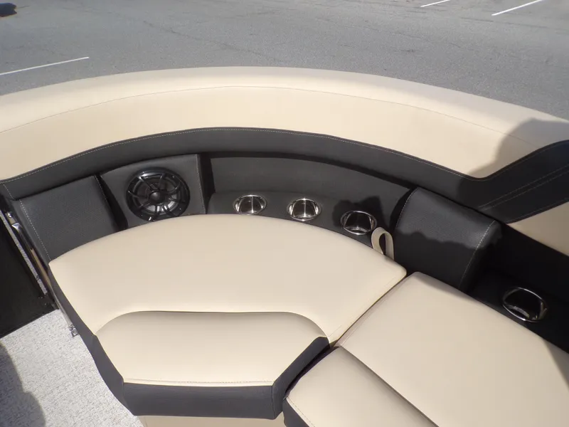 Slide: The Image of Control panel of 2024 Berkshire 22RFX CTS boat with various switches and gauges. - 7