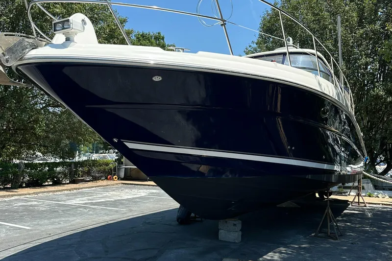 Slide: The Image of 2004 Sea Ray 390 Sundancer yacht on dry dock. - 15