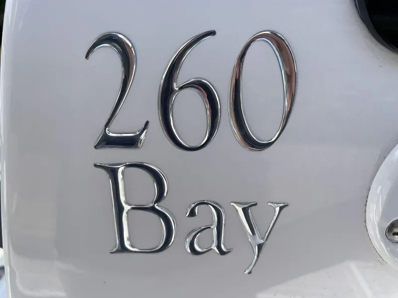 Slide: The Image of 260 Bay emblem on 2023 Velocity 26 BAY HYBRID boat. - 17