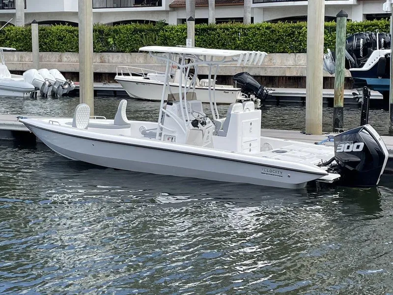 Slide: The Image of 2023 Velocity 26 BAY HYBRID boat docked at marina. - 3