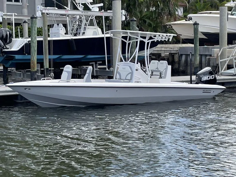 Slide: The Image of 2023 Velocity 26 BAY HYBRID boat docked in marina. - 4