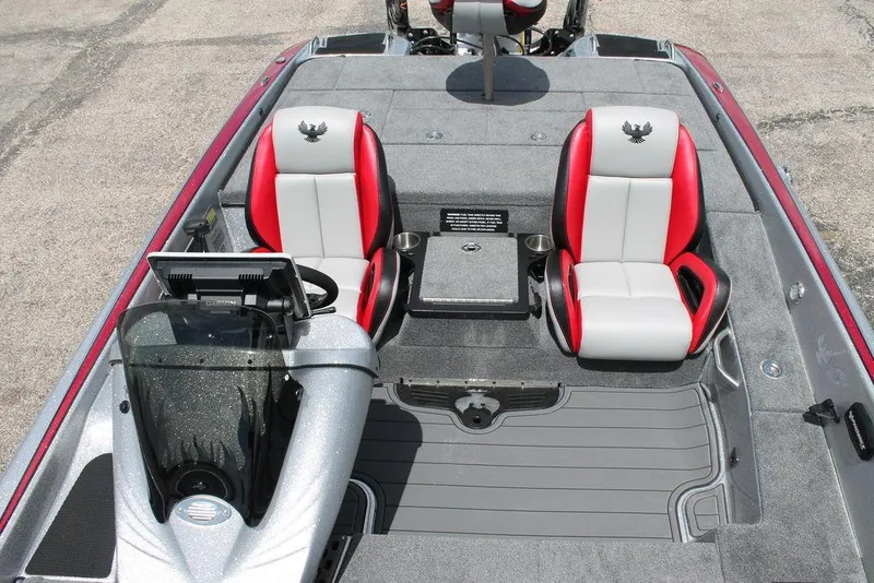 Slide: The Image of 2025 Phoenix 921 ELITE boat interior with red and white seats. - 11