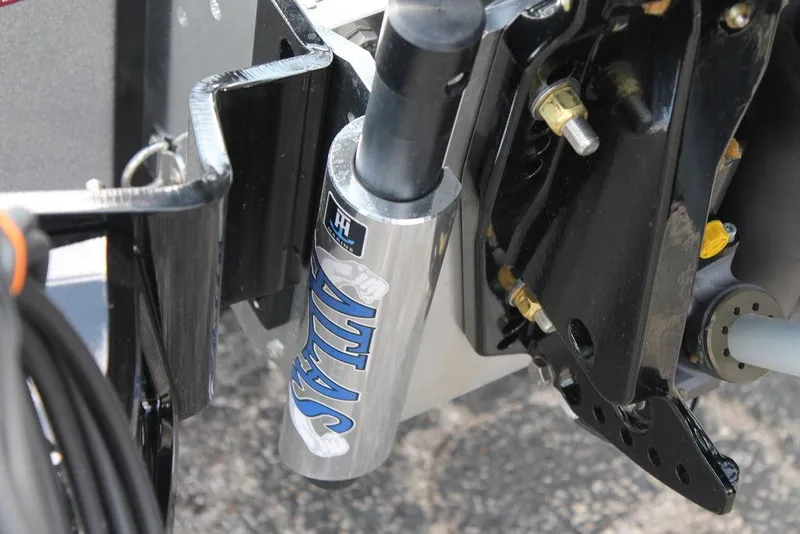 Slide: The Image of Close-up of 2025 Phoenix 921 ELITE boat suspension system. - 6