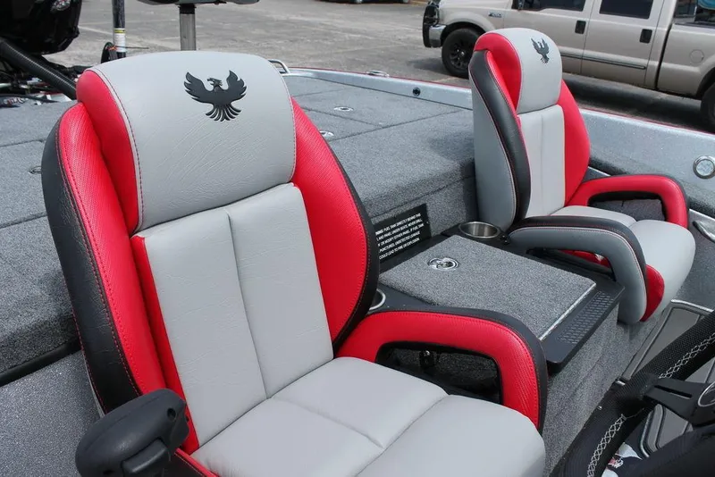 Slide: The Image of 2025 Phoenix 921 ELITE boat seats, red and gray upholstery, with logo. - 8