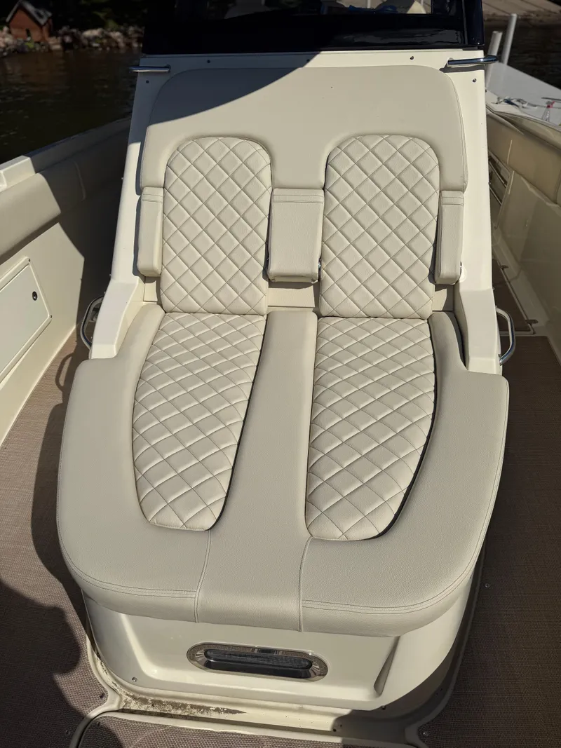Slide: The Image of Luxurious seating on 2019 Chris-Craft Catalina 34 boat with quilted upholstery. - 28