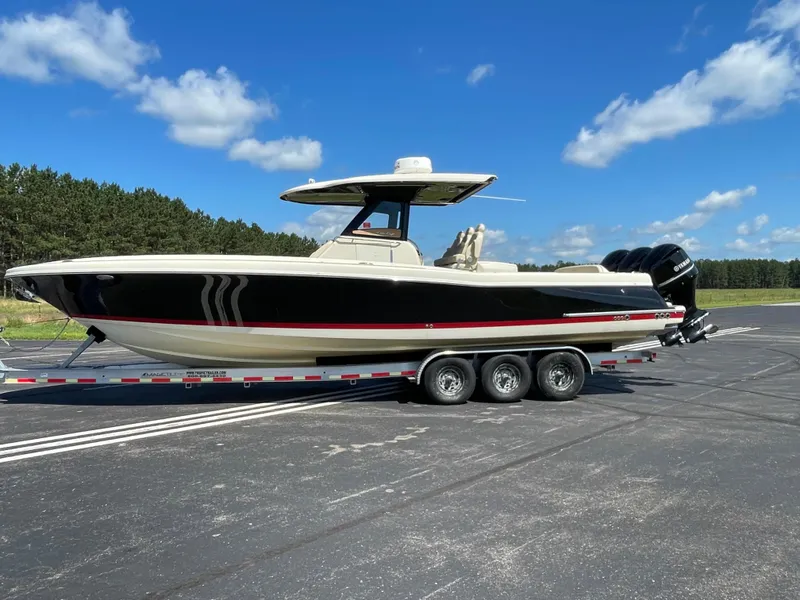 Slide: The Image of 2019 Chris-Craft Catalina 34 boat on a trailer, black and white exterior. - 3