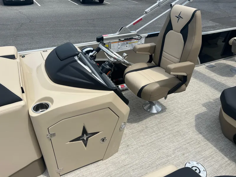 Slide: The Image of 2024 Berkshire 23RFC STS 2.75 boat helm with captain's chair and control console. - 8