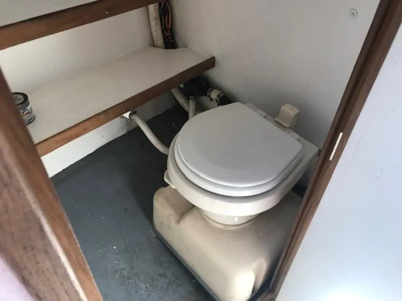 Slide: The Image of 2003 Eastern 27' Lobster boat interior toilet with wooden shelf. - 10