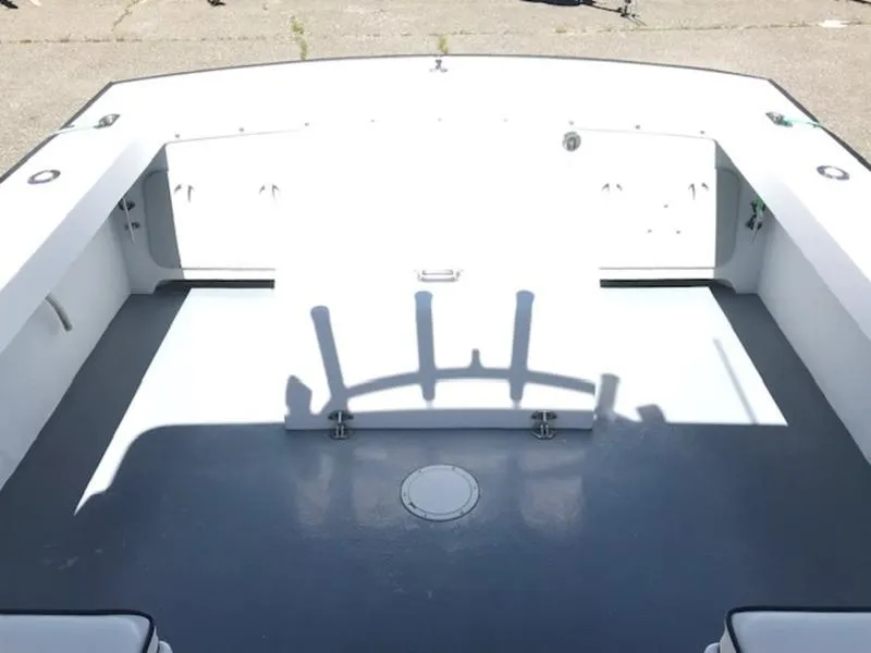 Slide: The Image of 2003 Eastern 27' Lobster boat deck with rod holders and storage compartments. - 16
