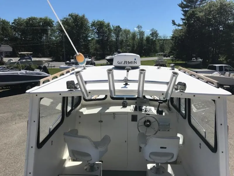 Slide: The Image of 2003 Eastern 27' Lobster boat cockpit with Garmin navigation system. - 5