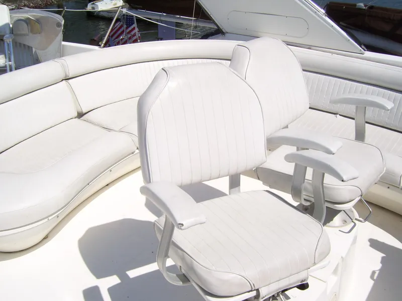 Slide: The Image of White seating area on 1999 Bayliner 5788 Pilot House Motoryacht deck. - 35