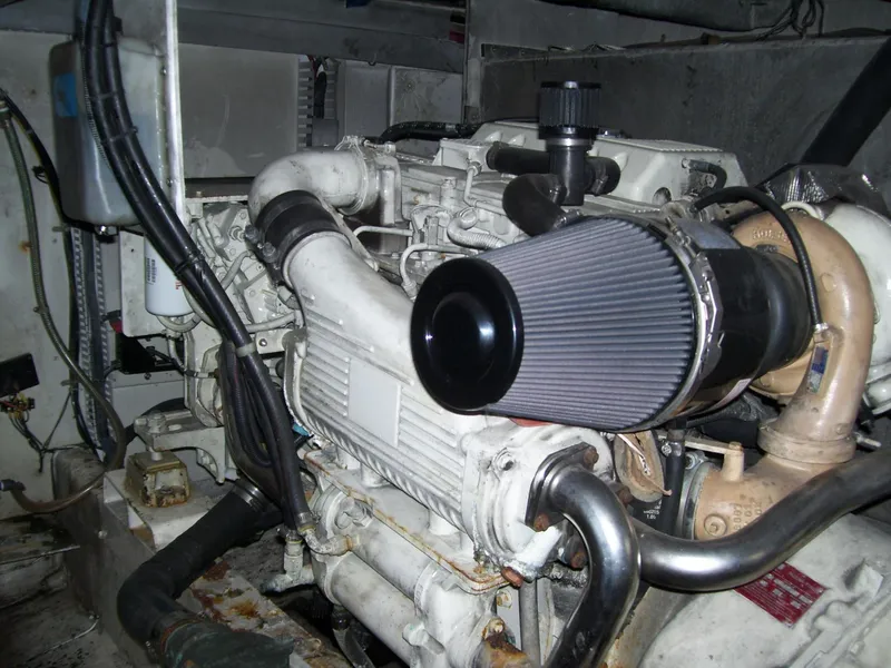 Slide: The Image of Engine of 1999 Bayliner 5788 Pilot House Motoryacht, showcasing intricate mechanical components. - 45
