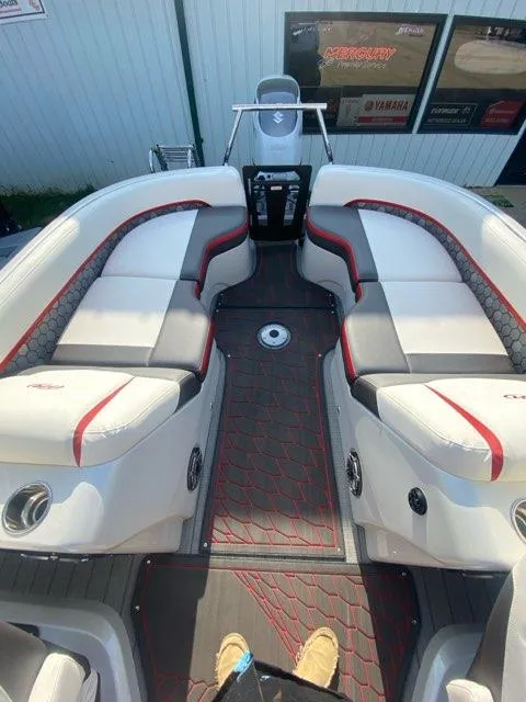 Slide: The Image of 2024 Manitou XT RFXW SHP boat interior with stylish seating and modern design. - 3
