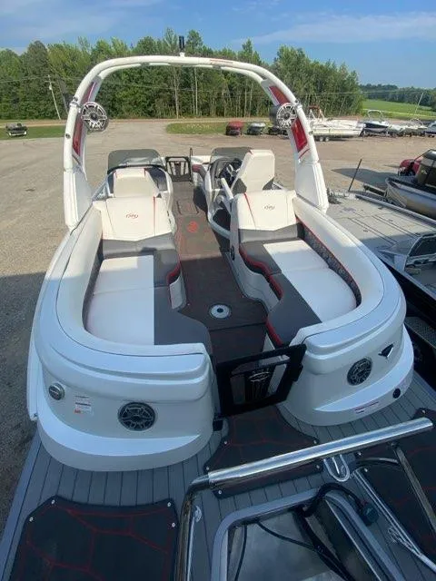 Slide: The Image of 2024 Manitou XT RFXW SHP pontoon boat with spacious seating and modern design. - 4
