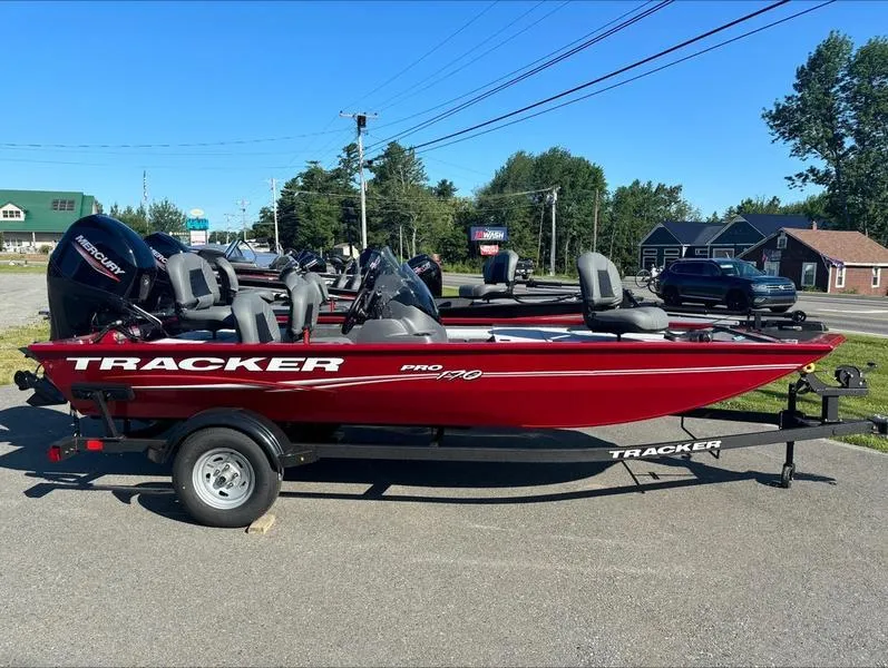Slide: The Image of 2024 Tracker Pro 170 red fishing boat on trailer. - 4