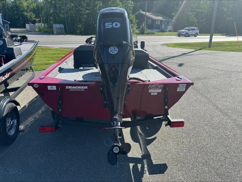 Slide: The Image of 2024 Tracker Pro 170 boat with 50 HP Mercury outboard motor, rear view. - 7