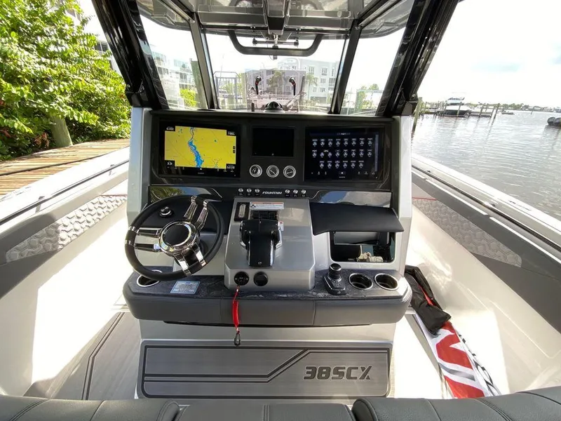 Slide: The Image of 2025 Fountain 38 SCX boat interior with stylish seating and modern design. - 17