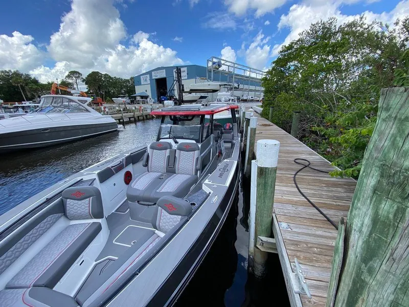 Slide: The Image of 2025 Fountain 38 SCX boat interior with modern seating and sleek design. - 21