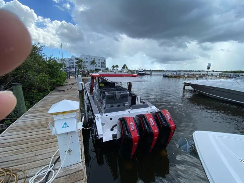 Slide: The Image of 2025 Fountain 38 SCX boat interior with sleek design and modern seating. - 22