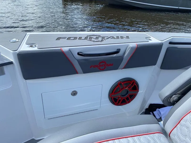 Slide: The Image of 2025 Fountain 38 SCX boat displayed outdoors on a sunny day. - 6