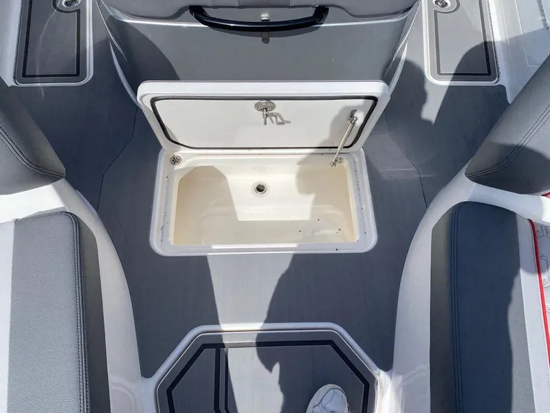 Slide: The Image of 2025 Fountain 38 SCX boat with triple 400R outboard engines, docked near palm trees. - 9